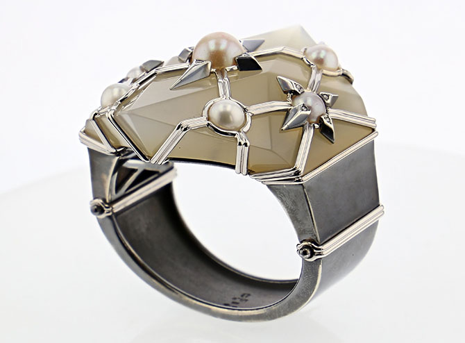 Elie Top made a broken chalcedony Suzanne Belperron cuff wearable again for a client by adding elements from his Cosmogonie Secrète designs to the jewel including pearl, white gold, blackened silver and diamond stars. Photo courtesy