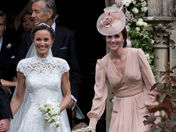 ENGLEFIELD GREEN, ENGLAND - MAY 20: Pippa Middleton and Catherine, Duchess of Cambridge attend the wedding of Pippa Middleton and James Matthews at St Mark's Church on May 20, 2017 in Englefield Green, England. (Photo by UK Press Pool/UK Press via Getty Images)