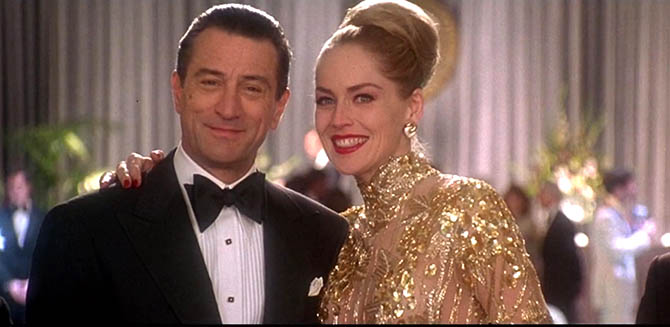 Robert DeNiro with Sharon Stone wearing Bulgari earrings and a beaded gold gown in 'Casino.' Photo Universal Pictures