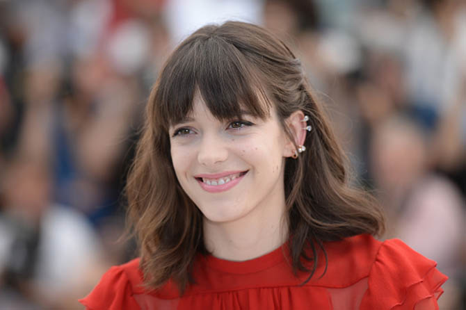 CANNES, FRANCE - MAY 21: Actress Stacy Martin in a Repossi ear cuff at the "Redoubtable (Le Redoutable)" photocall during the 70th annual Cannes Film Festival at Palais des Festivals on May 21, 2017 in Cannes, France. (Photo by Stephane Cardinale - Corbis/Corbis via Getty Images)
