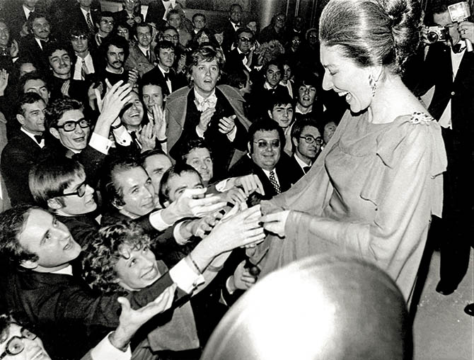 Adoring fans surrounding Maria Callas on her final tour in 1973 wearing her ruby and diamond Van Cleef & Arpels brooch. Photo from 'Maria by Callas' published by Assouline @AGIP/ArchiviFarabola