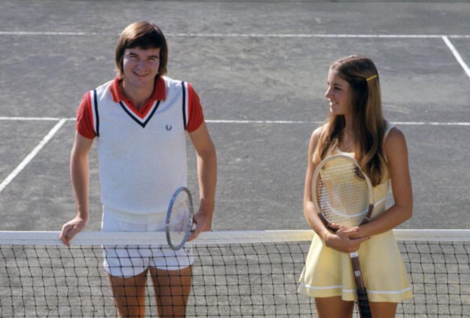 Jimmy Connors poses on the court with Chris Evert in 1974. Photo Getty