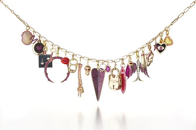 Gemfields x Muse charm necklace featuring charms from several designers. Photo by Doug Rosa