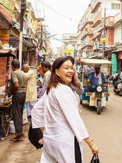 Modern Moghul designer Bibiana Dykema walking the streets of India. Photo courtesy