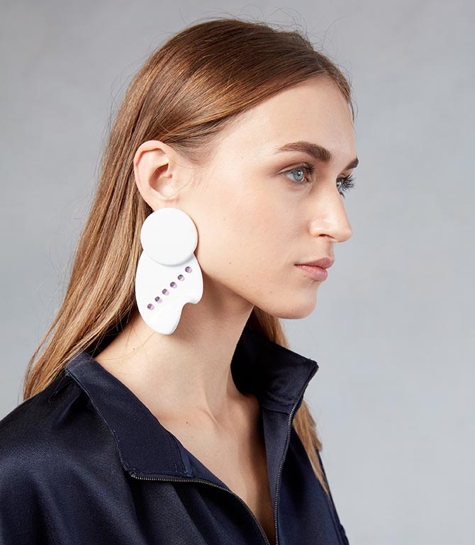 Model from the Tibi show wearing the earring done in collaboration with Paige Novick and Githan Coopoo