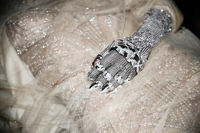 Daphne Guinness wearing the Contra Mundum Evening Glove of 18K white gold and diamonds during the preview party for the piece in 2011. Photo Rachel Chandler via Vogue.com