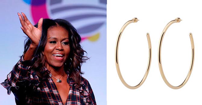 Former first lady Michelle Obama wearing Jennifer Fisher hoops speaks at the Obama Foundation Summit in Chicago, Illinois, November 1, 2017. / AFP PHOTO / Jim Young (Photo credit should read JIM YOUNG/AFP/Getty Images