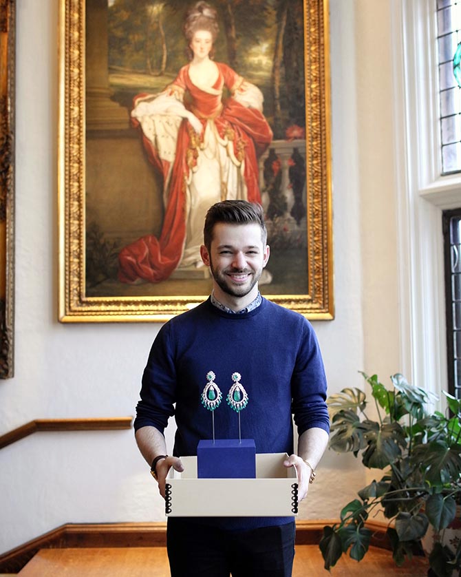 Levi carrying a pair of Doris Duke's earrings during the process of setting up the exhibition Designing for Doris: David Webb Jewelry & Newport's Architectural Gems Photo @levi_higgs/Instagram