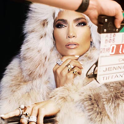 The Adventurine Posts J.Lo Wears Jewelry Worth Millions in “Dinero”
