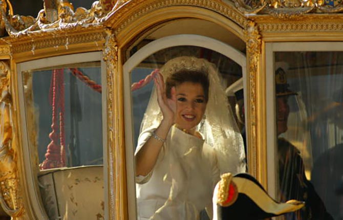 Dutch Crown Princess Maxima Zorreguieta waves from the Golden Coach after her wedding to Crown Prince Willem Alexander February 2, 2002 in Amsterdam, Holland. Photo Getty