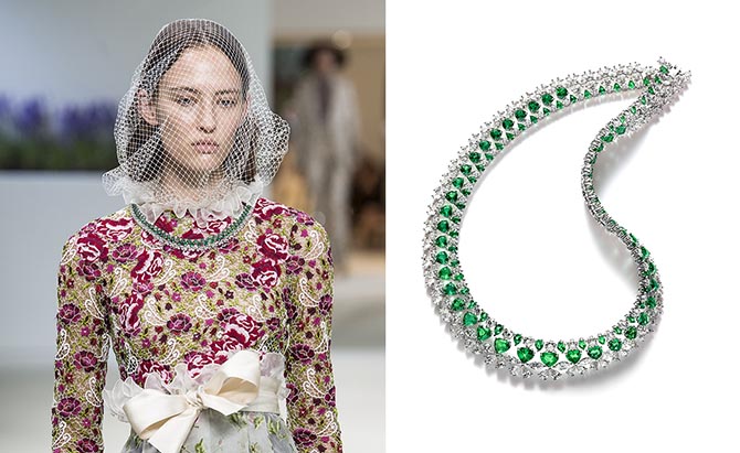 Model Ania Chiz wearing Giambattista Valli and a Chopard Necklace set with 42-carats of heart-shaped and pear-shaped emeralds and 40-carats of round, marquise and pear-shaped diamonds.
