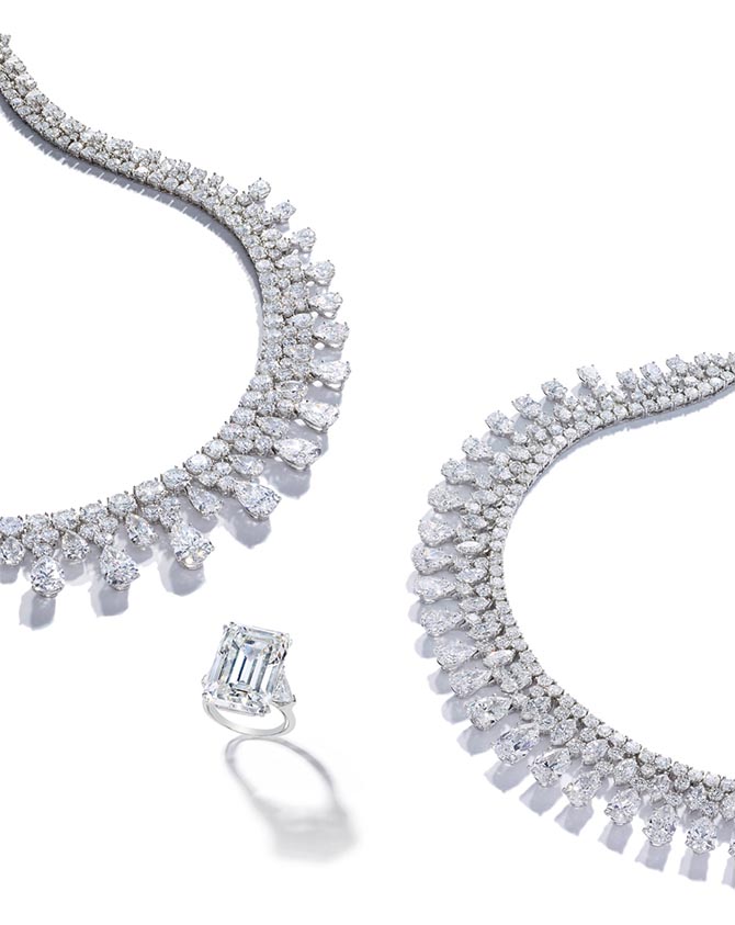 Katherine Domyan’s two Harry Winston diamond necklaces and 23.13-carat emerald cut diamond ring. Photo Bonhams