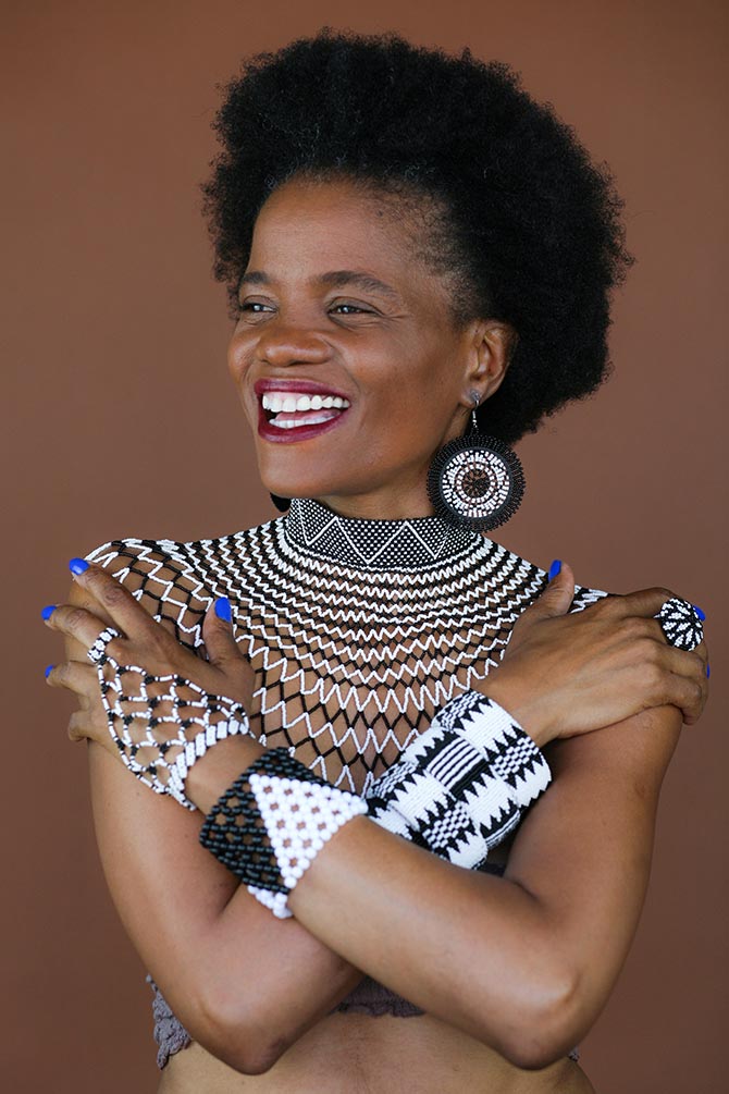 House of Yimama Founder Ntando Kunene wearing jewels from the collection. Photo Angela L Torress 