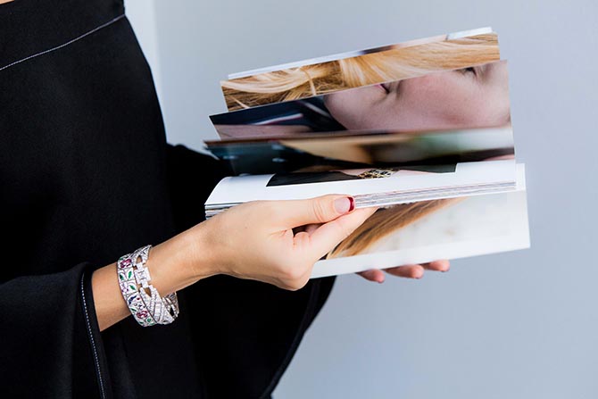 Liza Urla holding her book Gemologue: Street Jewellery Styles & Styling Tips. Photo Julia Flit GEM Kreatives