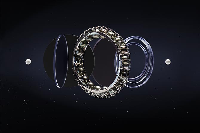 Les Galaxies de Cartier Alignment of the Planets Tahitian pearl and white gold bracelet. Photo Cartier