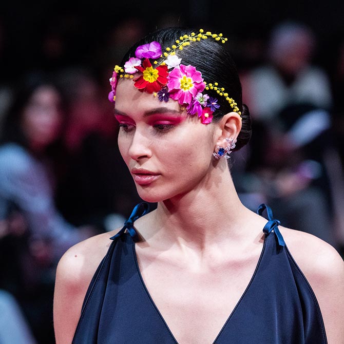 A model at the Alexis Mabille Spring '19 Couture show wearing Reza earrings