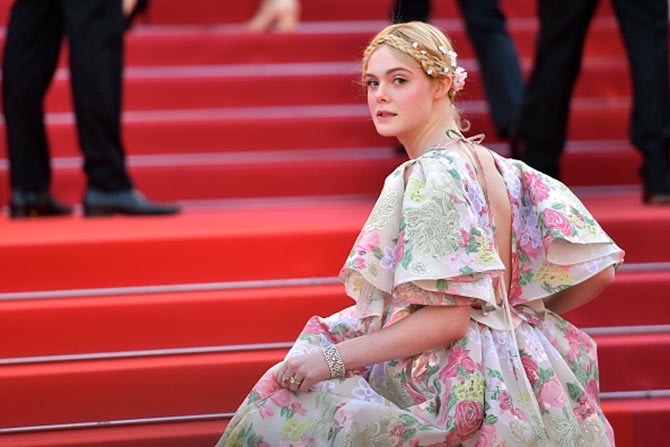 Elle Fanning wore rings and a bracelet by Chopard 