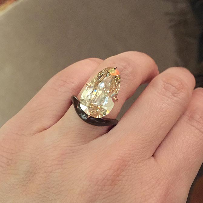 James de Givenchy ring I tried on at TEFAF that has all the design hallmarks of Scarlett Johansson's engagement ring from Colin Jost. Photo via Instagram @TheAdventurine