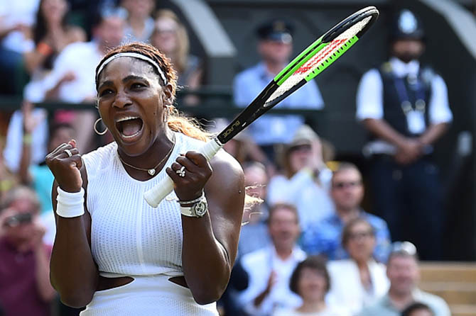 Serena Williams celebrating a point a Wimbledon in an image that shows all the jewelry she sported for the event. Photo Getty