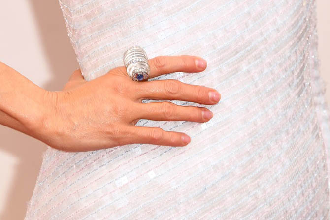 Detail of Renée Zellweger's hand and her crystal and diamond Arch Ring by David Webb at the Oscars.