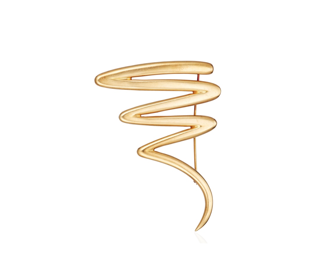A gold Scribble brooch by Paloma Picasso for Tiffany & Co. Photo via Christie's